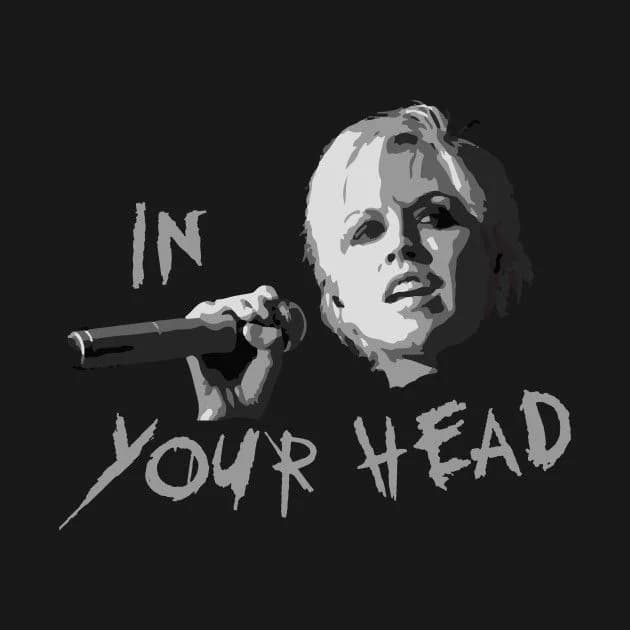 A stencil-style portrait of Dolores O'Riordan holding a microphone, with the words In Your Head